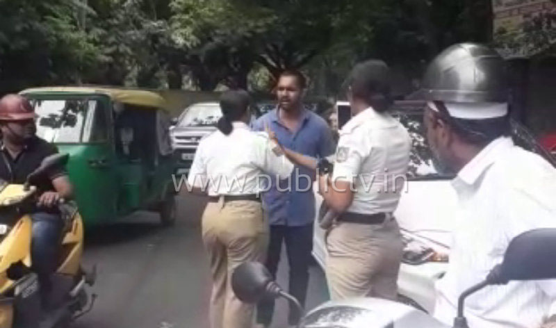 ನೋ ಪಾರ್ಕಿಂಗ್‍ನಲ್ಲಿ ಕಾರು ನಿಲ್ಲಿಸಿ ಮಹಿಳಾ ಪೊಲೀಸರಿಗೆ ಅವಾಜ್ ಹಾಕಿದ ಚಾಲಕ