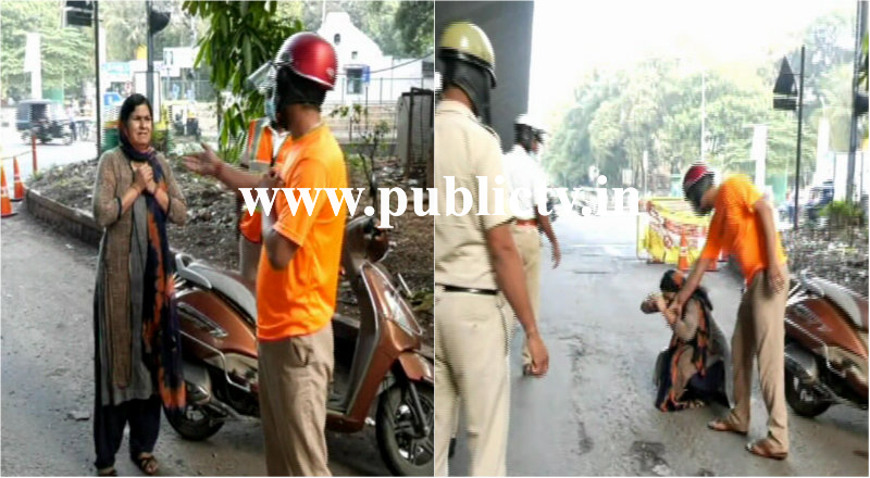 ವಾಹನ ತಡೆದ ಪೊಲೀಸರು- ಮಂಡಿಯೂರಿ ಬೇಡಿಕೊಂಡ ಮಹಿಳೆ