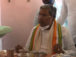 ಹನುಮ ಹುಟ್ಟಿದ ದಿನ ಗೊತ್ತಾ, ಸುಮ್ನೆ ತಿನ್ಲಾ- ಮಾಂಸಾಹಾರ ಭೋಜನ ಸವಿದ ಸಿದ್ದು