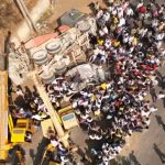 concrete mixer overturns on car belagavi