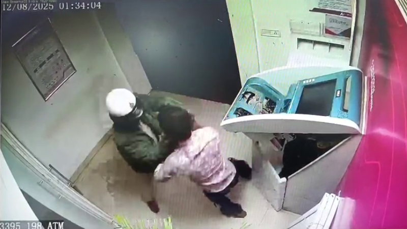 Thief arrested by ASI while stealing from ATM Horrifying scene captured on CCTV camera Ballari