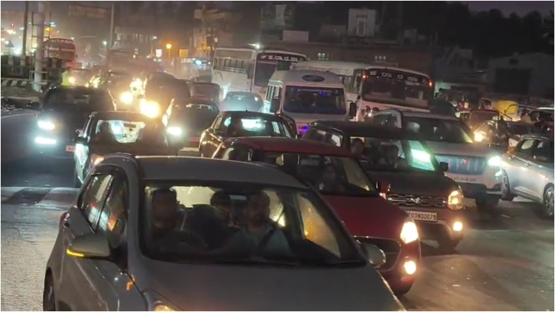 People heading towards Bengaluru 4 km traffic jam on Nelamangala Kunigal Road 1