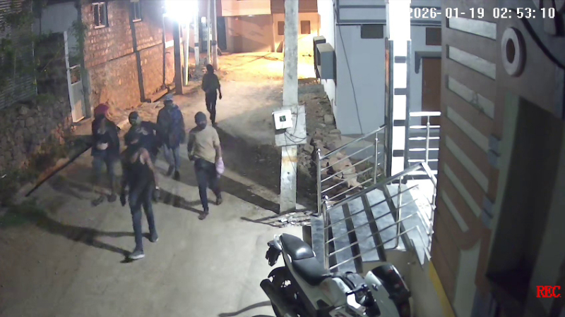 Thieves walking around Rabakavi wearing masks and holding sticks