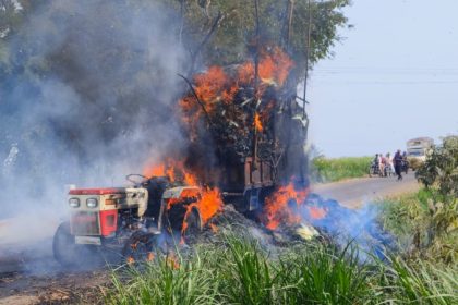 Tractor catches fire after touching electric wire while transporting sugarcane leaves jamkhandi