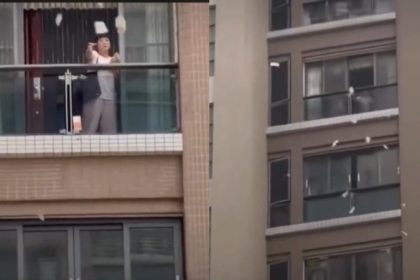 Chinese woman tosses out Rs1 5 crore cash from balcony after argument with husband