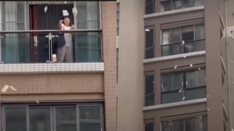 Chinese woman tosses out Rs1 5 crore cash from balcony after argument with husband