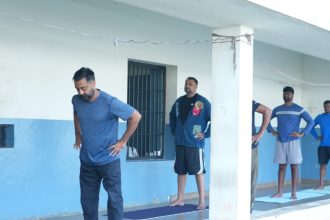 Yoga Day in Parappana Agrahara Actor Darshan Performs Asanas in Jail Corridor After DG Alok Kumars Advice Pavithra Gowda Joins Mass Yoga