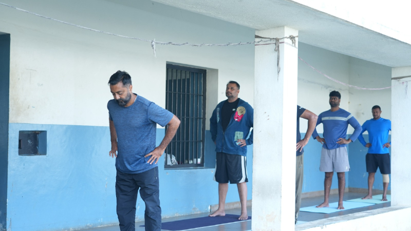 Yoga Day in Parappana Agrahara Actor Darshan Performs Asanas in Jail Corridor After DG Alok Kumars Advice Pavithra Gowda Joins Mass Yoga