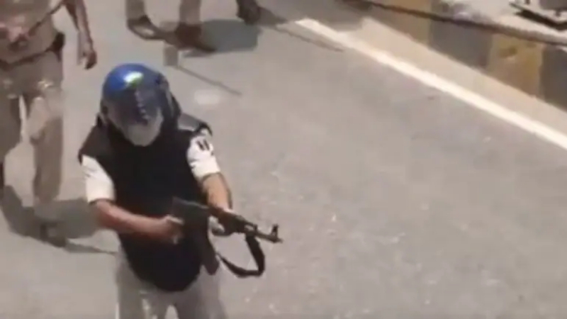 Bihar Cop Seen On Camera Firing At Protesting Students With AK 47 Suspended