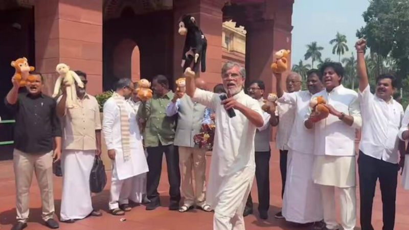 pawan khera brings toy monkey