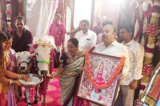 CM Siddaramaiahs Wife Parvathi Performs Go Pooja During Housewarming Ceremony Son Yathindra Holds Goddess Lakshmi Photo