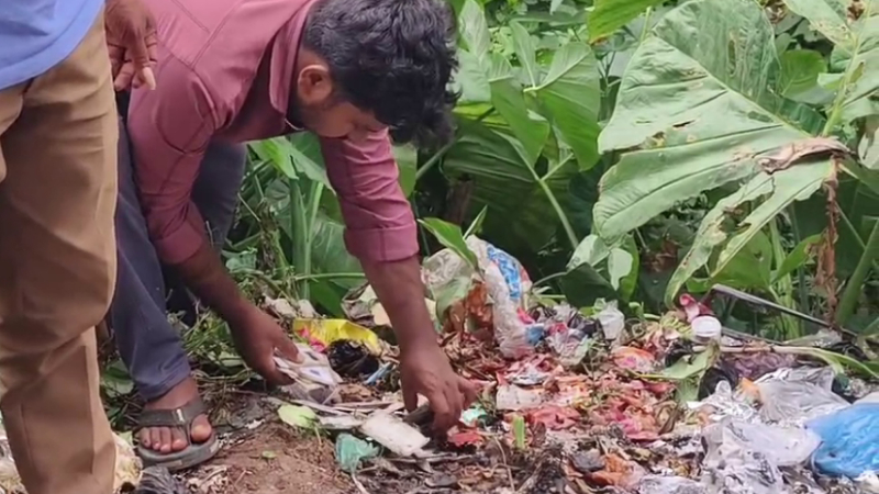 hundreds of half burnt voter id cards aadhaar cards and pan cards were found discarded near a hotel in sakleshpur town investigation ordered 1